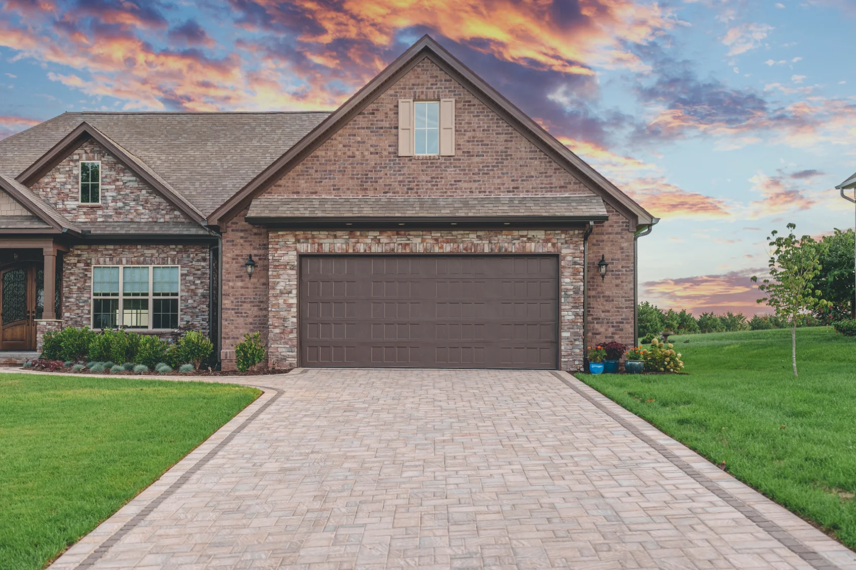 How to Maintain Hardscaping Year-round - Magnolia Landscape Construction Custom Hardscaping for a driveway and home